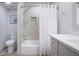 Updated bathroom with a shower/tub combo and vanity at 3921 E San Miguel Ave, Paradise Valley, AZ 85253