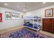 bedroom with bunk beds and colorful rug at 3921 E San Miguel Ave, Paradise Valley, AZ 85253