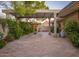 Charming courtyard with fountain, pergola, and mature landscaping at 3921 E San Miguel Ave, Paradise Valley, AZ 85253