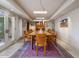 Spacious dining room featuring a long wood table and seating for twelve at 3921 E San Miguel Ave, Paradise Valley, AZ 85253