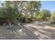 Long paver driveway leading to a mid-century home at 3921 E San Miguel Ave, Paradise Valley, AZ 85253