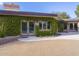 Brick home exterior with ivy-covered walls and double doors at 3921 E San Miguel Ave, Paradise Valley, AZ 85253