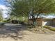 Mid-century modern home with brick facade and a long driveway at 3921 E San Miguel Ave, Paradise Valley, AZ 85253