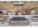 Stainless steel appliances and modern cabinetry highlight this chef's kitchen at 3921 E San Miguel Ave, Paradise Valley, AZ 85253