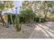 Xeriscaped front yard with cacti and agave plants at 3921 E San Miguel Ave, Paradise Valley, AZ 85253