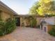 Outdoor patio with built-in grill and lush landscaping at 3921 E San Miguel Ave, Paradise Valley, AZ 85253