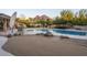 Inviting pool with patio furniture and mountain backdrop at 3921 E San Miguel Ave, Paradise Valley, AZ 85253