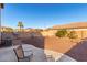 Backyard with gravel and view of neighboring homes at 403 S 228Th Ln, Buckeye, AZ 85326