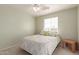 Bedroom with ceiling fan and window coverings at 403 S 228Th Ln, Buckeye, AZ 85326