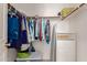 Walk-in closet with ample shelving and hanging space at 403 S 228Th Ln, Buckeye, AZ 85326