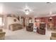 Open concept living room with kitchen and neutral color scheme at 403 S 228Th Ln, Buckeye, AZ 85326