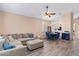 Spacious living room featuring a sectional sofa and dining area at 4109 E Barwick Dr, Cave Creek, AZ 85331