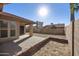 Sunlit backyard, featuring a patio and gravel at 4149 W Park Ave, Chandler, AZ 85226