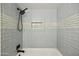 Shower with gray tile and built-in niche at 4149 W Park Ave, Chandler, AZ 85226