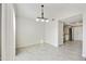 Bright dining area with tile floors and kitchen access at 4149 W Park Ave, Chandler, AZ 85226