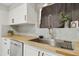 Modern kitchen with wood countertops and stainless steel sink at 4149 W Park Ave, Chandler, AZ 85226