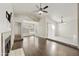 Living room with hardwood floors, fireplace, and access to backyard at 4149 W Park Ave, Chandler, AZ 85226