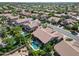 Aerial view showcasing house, pool and neighborhood at 4410 E Robin Ln, Phoenix, AZ 85050