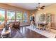 Elegant dining room features a formal table, chandelier, and hardwood floors at 4410 E Robin Ln, Phoenix, AZ 85050