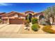Charming single-story home with a well-maintained front yard and desert landscaping under a bright blue sky at 4410 E Robin Ln, Phoenix, AZ 85050