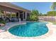 Stunning kidney shaped pool with large patio and BBQ area at 4410 E Robin Ln, Phoenix, AZ 85050