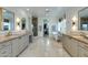 Luxurious bathroom with double vanities and soaking tub at 4643 E Montecito Ave, Phoenix, AZ 85018