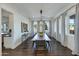 Bright dining room with hardwood floors and large windows at 4643 E Montecito Ave, Phoenix, AZ 85018