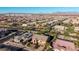 Neighborhood aerial view featuring desert landscaping, tiled roofs, and an amazing view of mountains in the distance at 4813 S Quantum Way, Mesa, AZ 85212