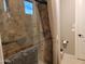 Clean bathroom with a tiled shower and modern fixtures at 4813 S Quantum Way, Mesa, AZ 85212