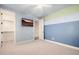 Bedroom features a ceiling fan and walk-in closet with shelving at 4813 S Quantum Way, Mesa, AZ 85212