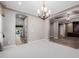 Open dining room showing archways, neutral colors, and access to other areas of the house at 4813 S Quantum Way, Mesa, AZ 85212