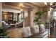 Elegant dining room with built-in shelving and large windows at 4813 S Quantum Way, Mesa, AZ 85212