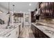 Kitchen with a view of stainless steel appliances, granite countertops, and tiled backsplash at 4813 S Quantum Way, Mesa, AZ 85212