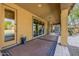 Expansive covered patio offering a seamless indoor-outdoor living experience and shade at 4813 S Quantum Way, Mesa, AZ 85212