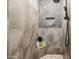 Shower featuring neutral tile and corner shelf at 4813 S Quantum Way, Mesa, AZ 85212