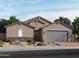 Craftsman style home with stone accents and a two-car garage at 4847 W Hunter Trl, San Tan Valley, AZ 85144