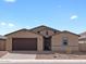 Charming single-Gathering home with a two-car garage and neutral stucco exterior at 4847 W Hunter Trl, San Tan Valley, AZ 85144