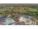 Aerial view of community amenities including pools and sports fields at 4905 W Magellan Dr, New River, AZ 85087