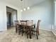 Charming dining room with wood table and chairs, ready for Gathering meals at 4905 W Magellan Dr, New River, AZ 85087