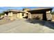 House exterior showcasing a two-car garage and desert landscaping at 4905 W Magellan Dr, New River, AZ 85087