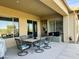 Covered patio with seating area, perfect for outdoor dining at 4905 W Magellan Dr, New River, AZ 85087