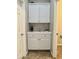 White storage cabinets with additional counter space at 4905 W Magellan Dr, New River, AZ 85087