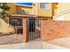 Close-up view of the townhome's entrance and gate at 510 N Alma School Rd # 158, Mesa, AZ 85201