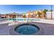 Community pool and spa with surrounding patio at 510 N Alma School Rd # 158, Mesa, AZ 85201