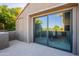 Private patio with sliding glass doors and tranquil views at 5122 E Shea Blvd # 2054, Scottsdale, AZ 85254