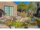 Peaceful water feature with a pond and waterfall at 5122 E Shea Blvd # 2054, Scottsdale, AZ 85254