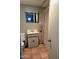 Small bathroom with shower, tile floors and vintage vanity at 537 W El Caminito Dr, Phoenix, AZ 85021