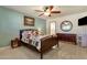 Main bedroom with wood furniture and large mirror at 537 W El Caminito Dr, Phoenix, AZ 85021