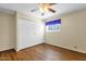 Bedroom with hardwood floors and large closet at 537 W El Caminito Dr, Phoenix, AZ 85021