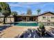 Relaxing kidney-shaped pool and patio at 537 W El Caminito Dr, Phoenix, AZ 85021